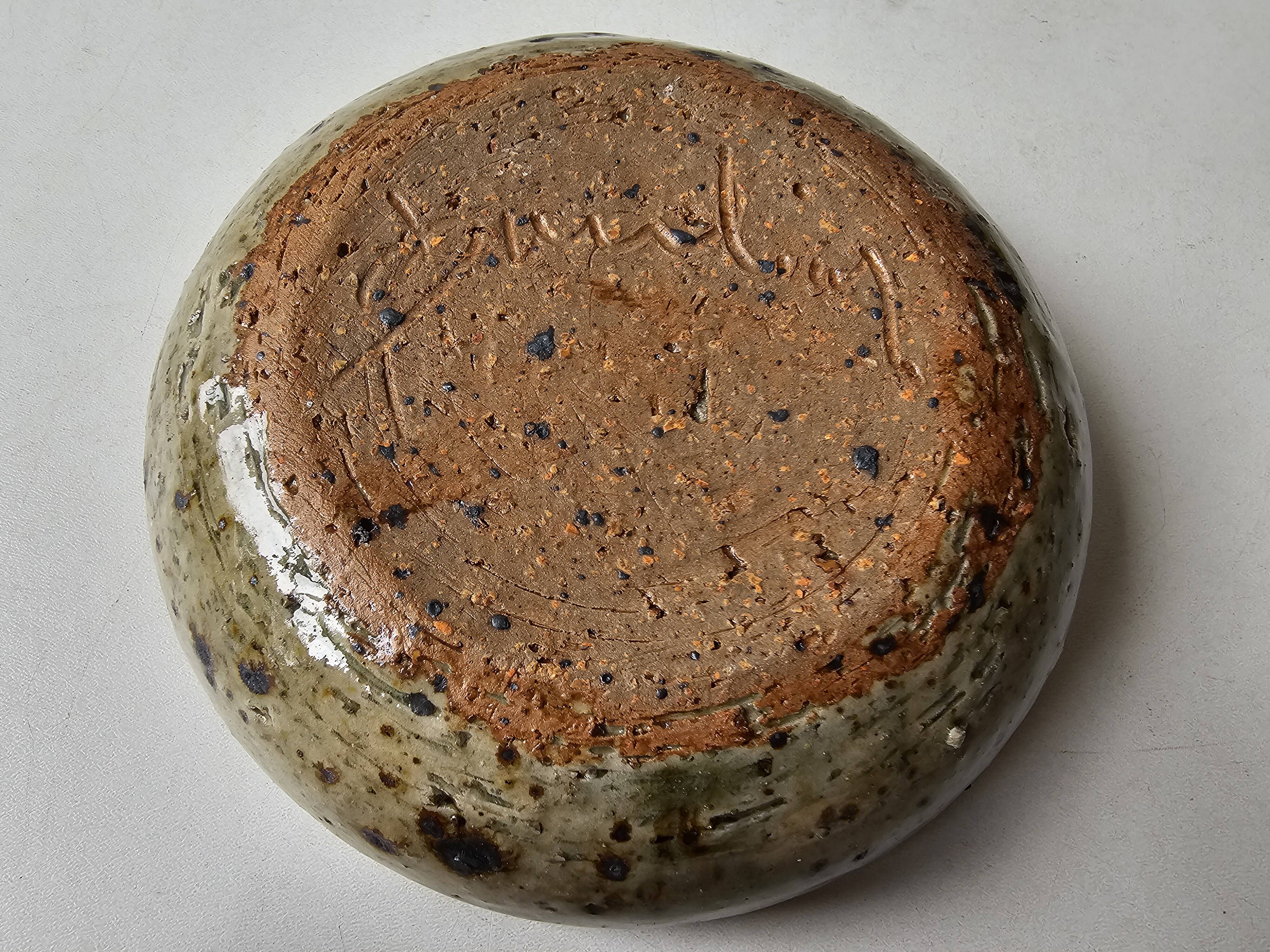 Ceramic bowl emptier with floral motif by suzanne dauliach