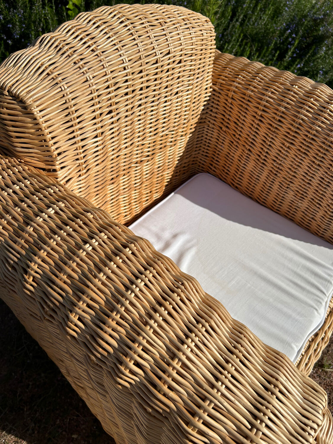 Large rattan armchairs