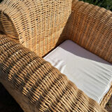Large rattan armchairs