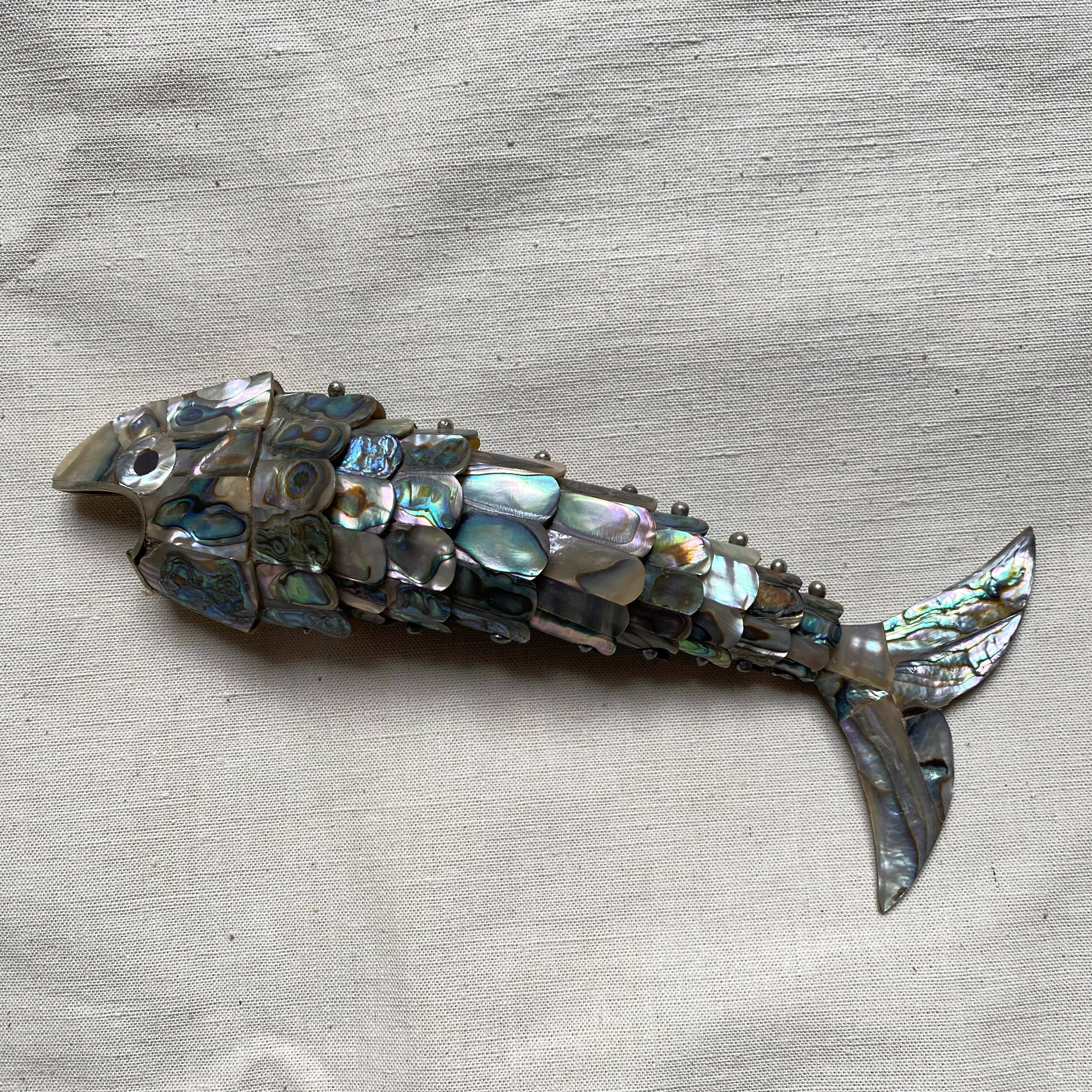 Fish-shaped bottle opener made of seashell and brass, 1970s