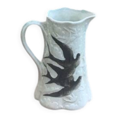 Jade green ceramic barbotine vase with swallows.