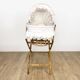 Bamboo bassinet on a stand, bohemian 1970s.