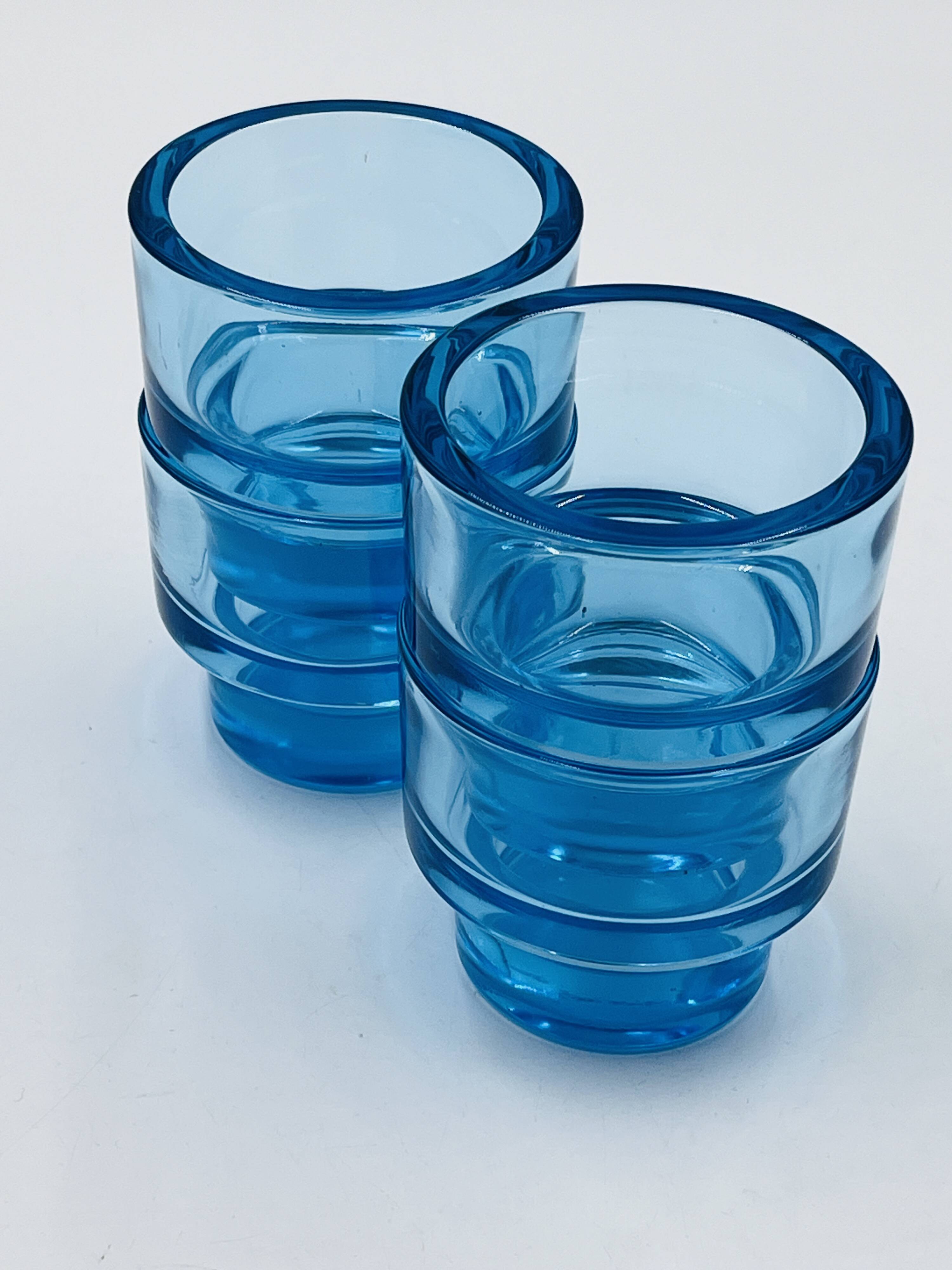 Set of 4 IKEA turquoise aquamarine glass candle holders.