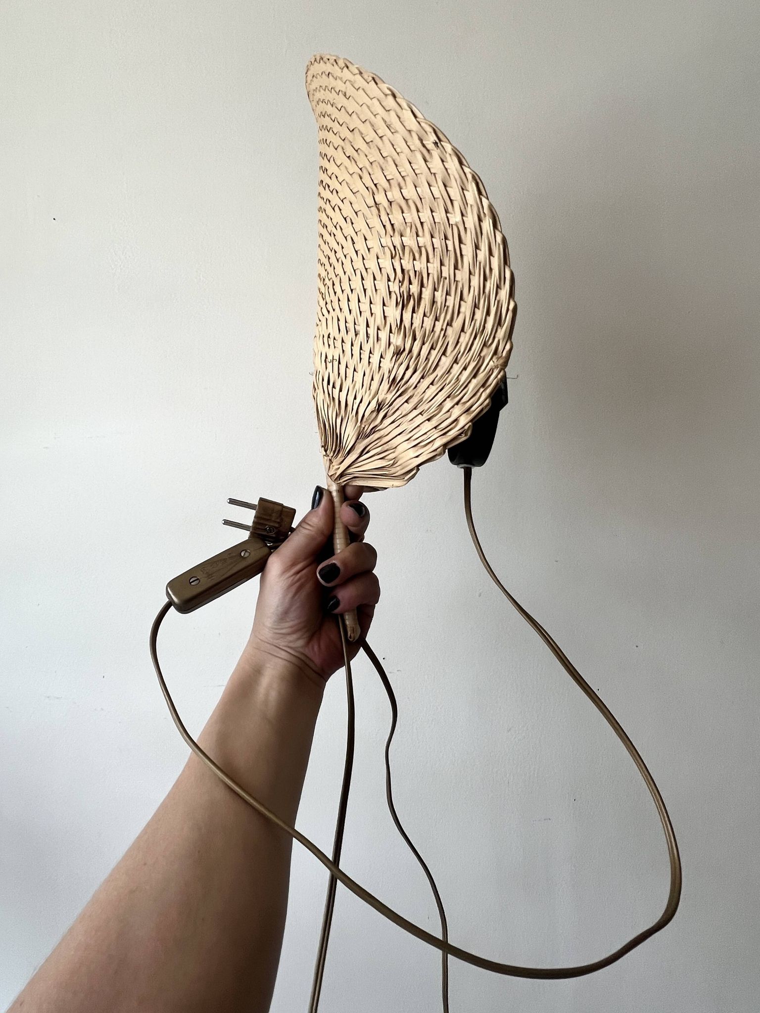 Woven rattan wall light in the style of Igno Maurer, design from the 1970s.