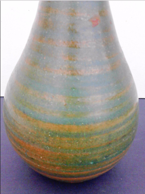 Ceramic vase signed.