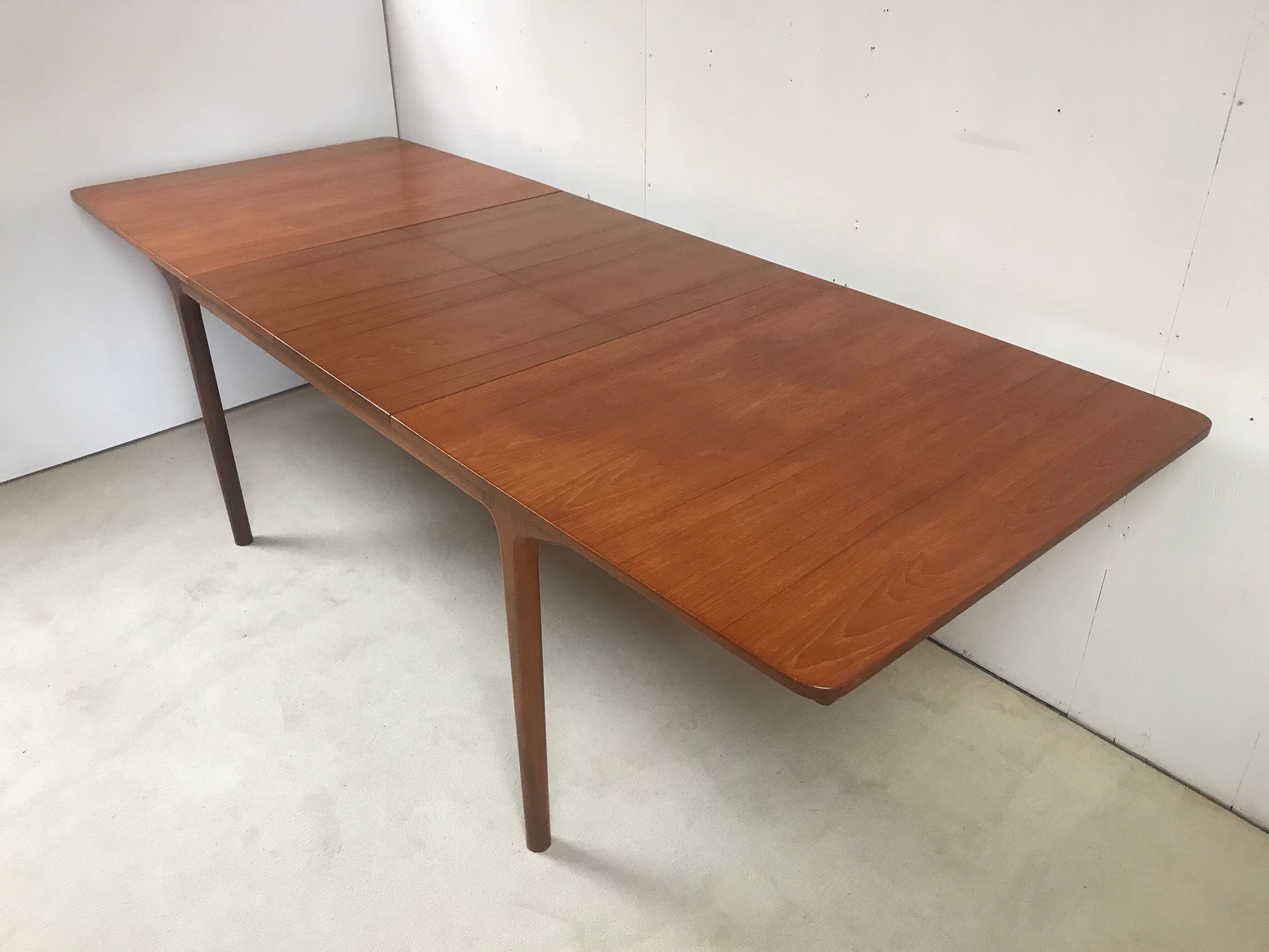McIntosh extending teak table designed by Tom Robertson 60’s