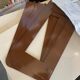 Modular metal wall shelf in brown and beige vintage 70s design.