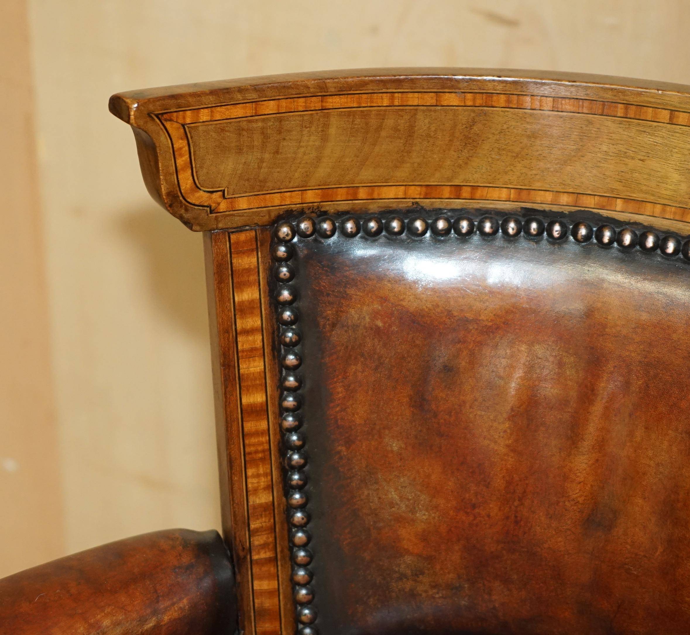 Victorian captain's chair in leather restored by Cornelius V Smith.