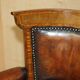 Victorian captain's chair in leather restored by Cornelius V Smith.