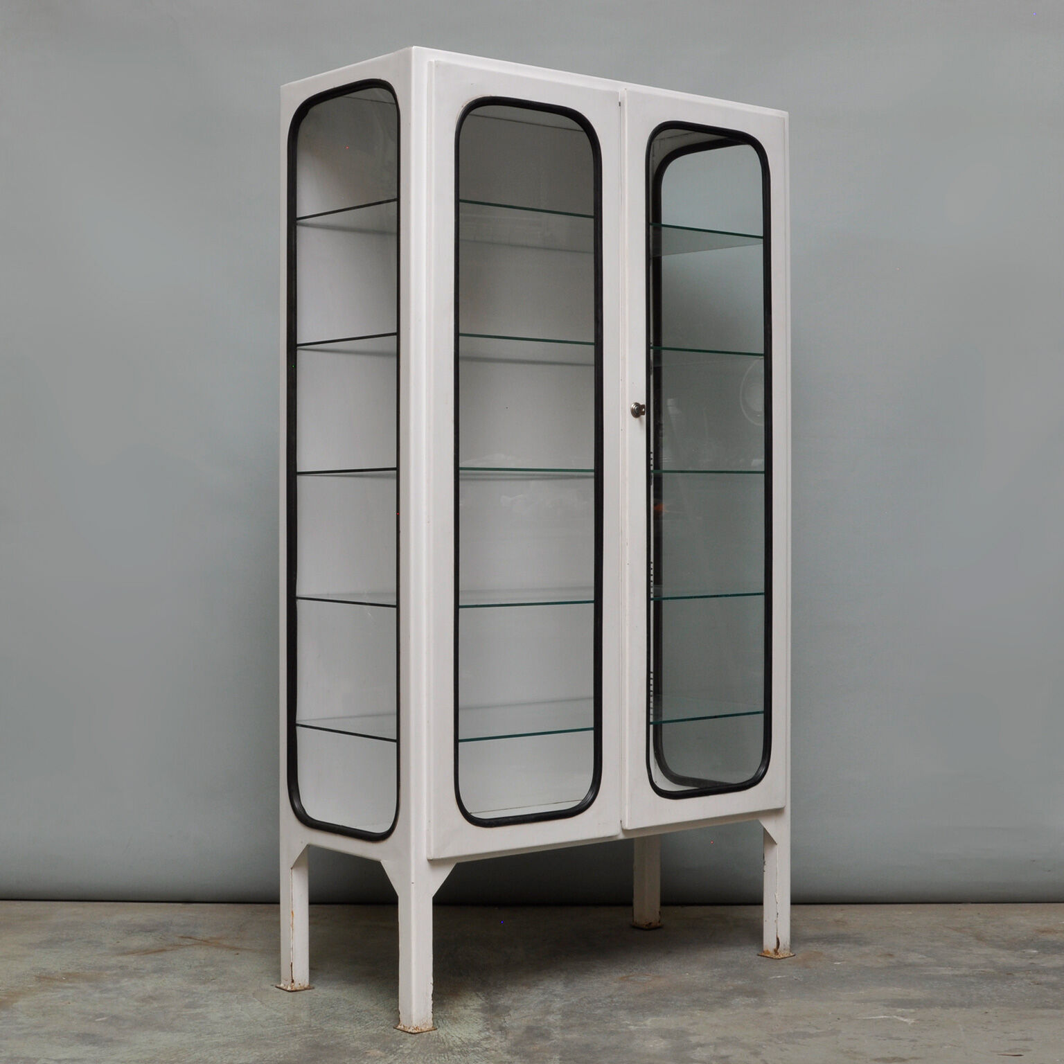 Vintage iron and glass medical cabinet of the 1970s