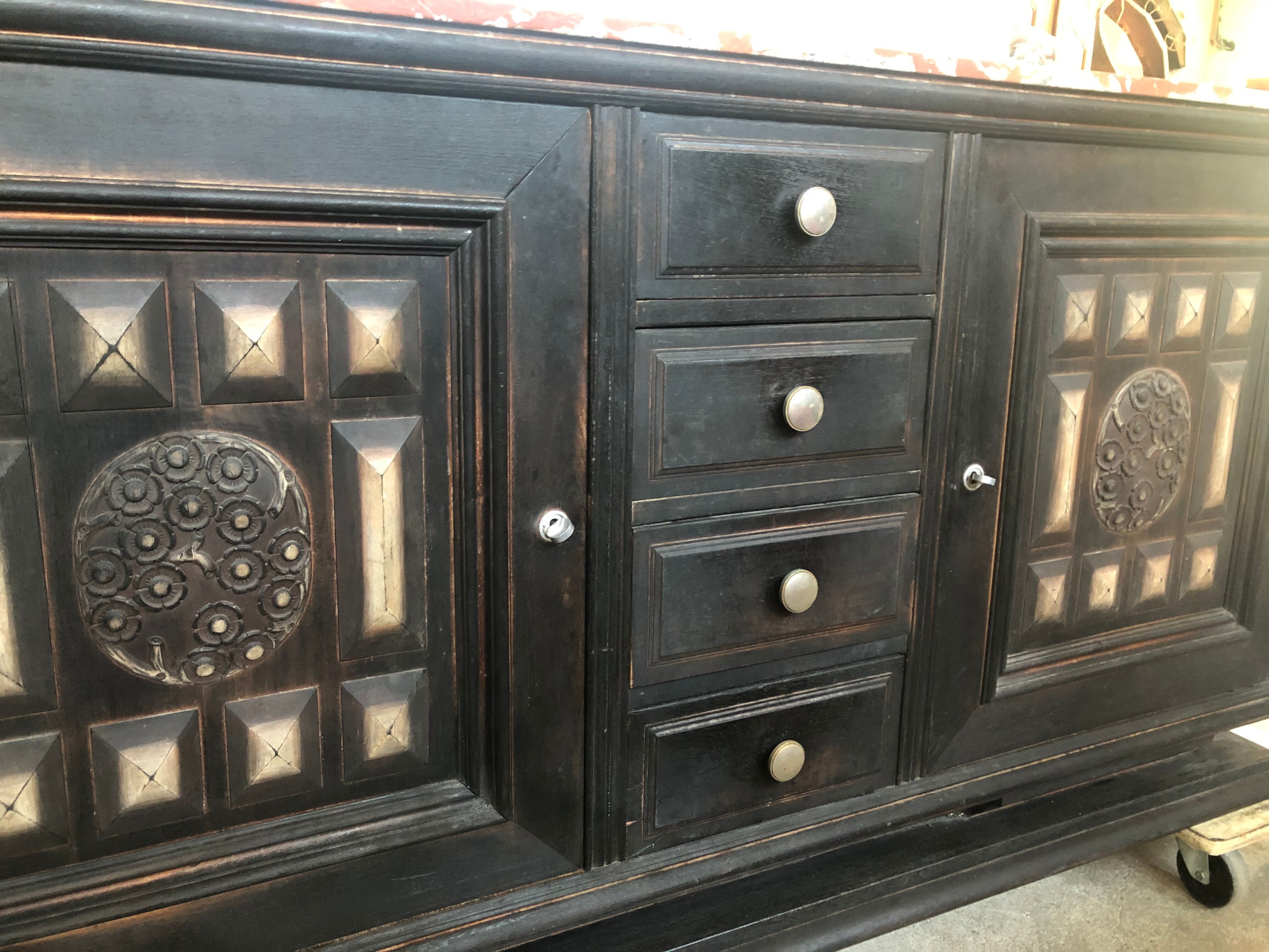 Blackened wooden sideboard of the 1950s