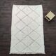 Beni Ouarain Berber rug with red diamond, 170 x 250 cm.