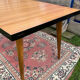 Vintage dining table designed by Charles Ramos from the 50s