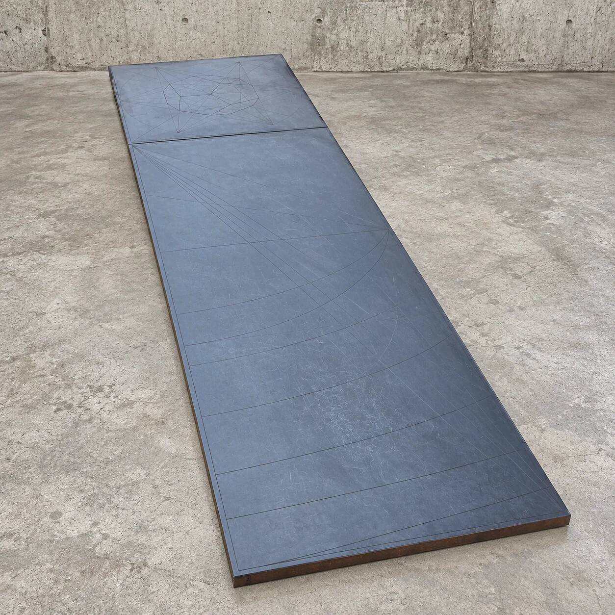 Weighty coffee table with solid iron frame and stone slate table tops, made on commission by architect Alex Vervoordt, Belgium 1990s