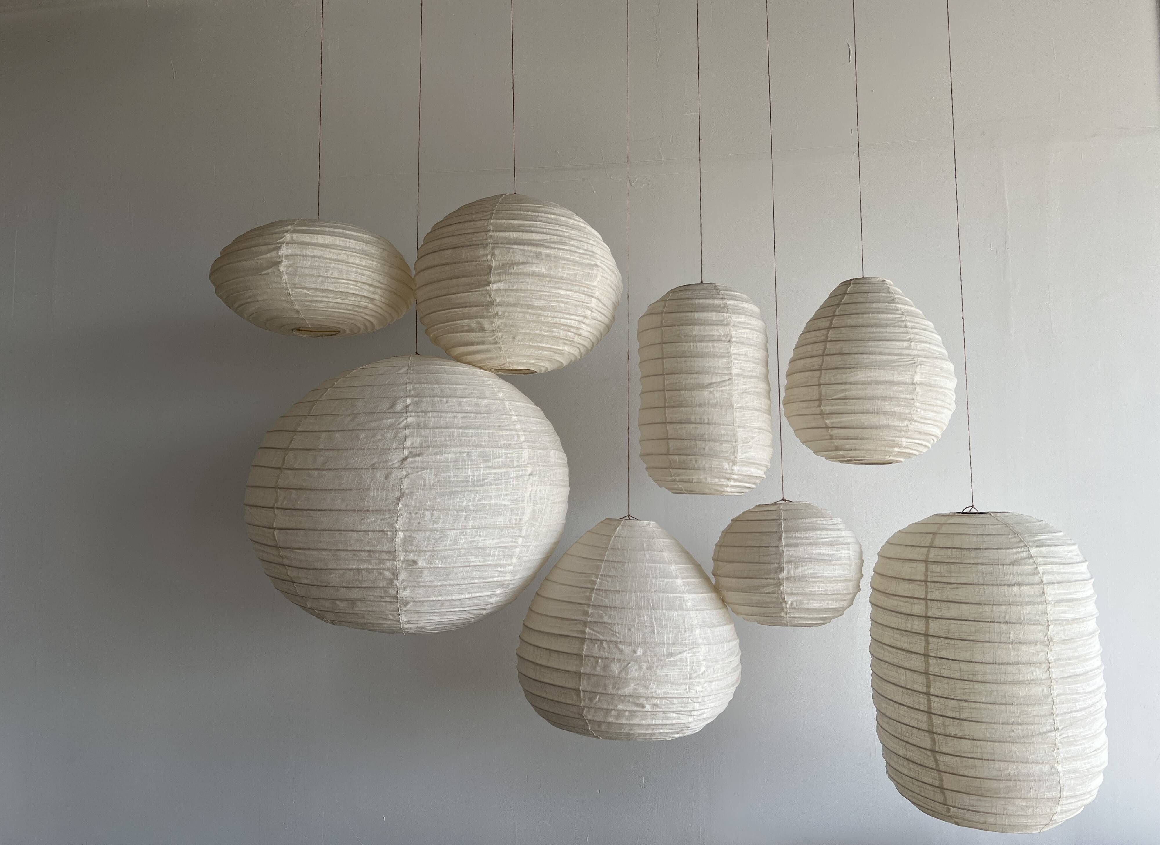Small Japanese-style natural rattan and linen pendant light in the shape of a drop H40 D35