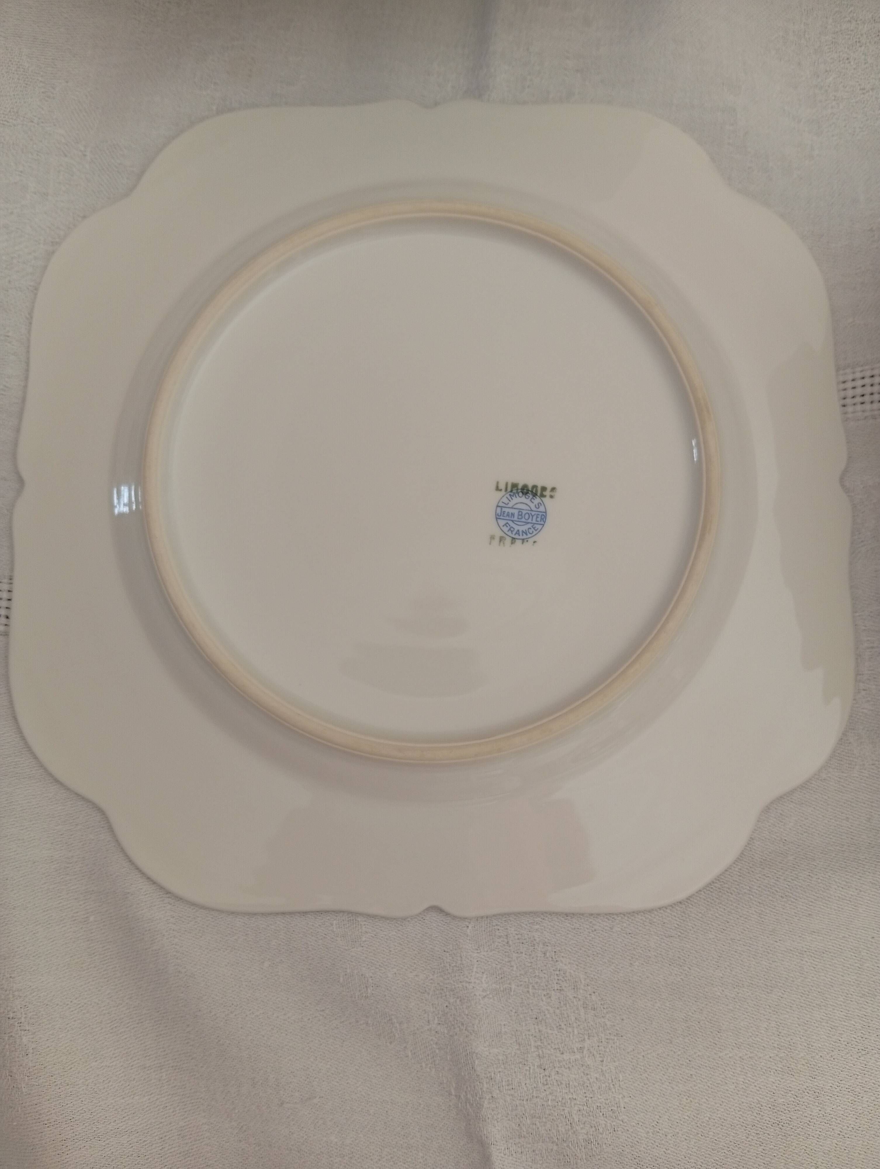 Jean BOYER Limoges FRANCE part of a white porcelain table service.