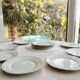 Set of 12 flat plates made of Limoges porcelain