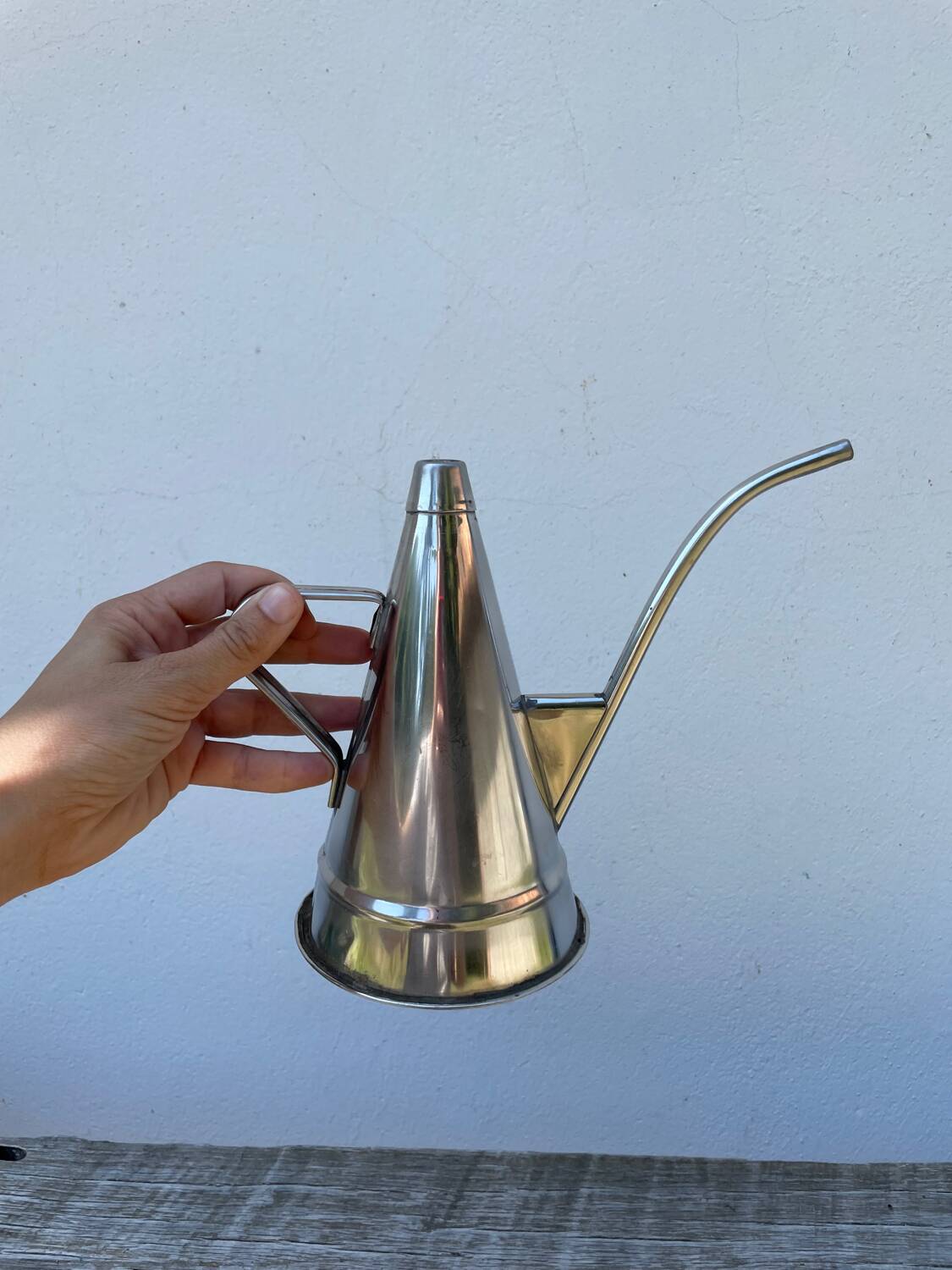 Small stainless steel watering can