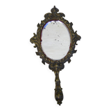 Hand-facing mirror in gilded bronze