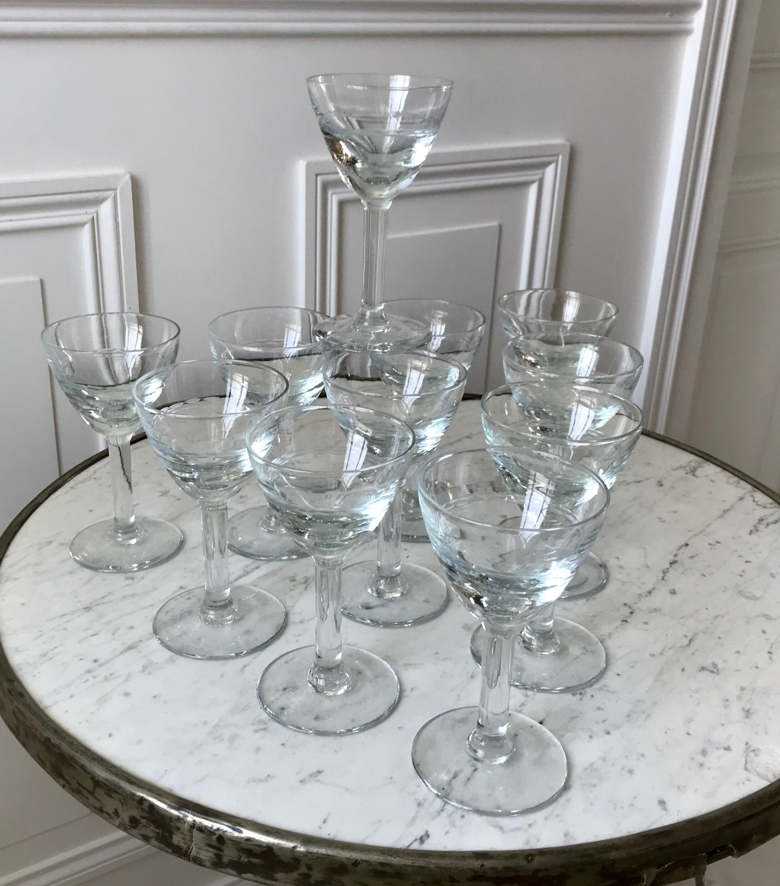 Set of 11 molded glass wine glasses engraved 20s