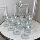 Set of 11 molded glass wine glasses engraved 20s