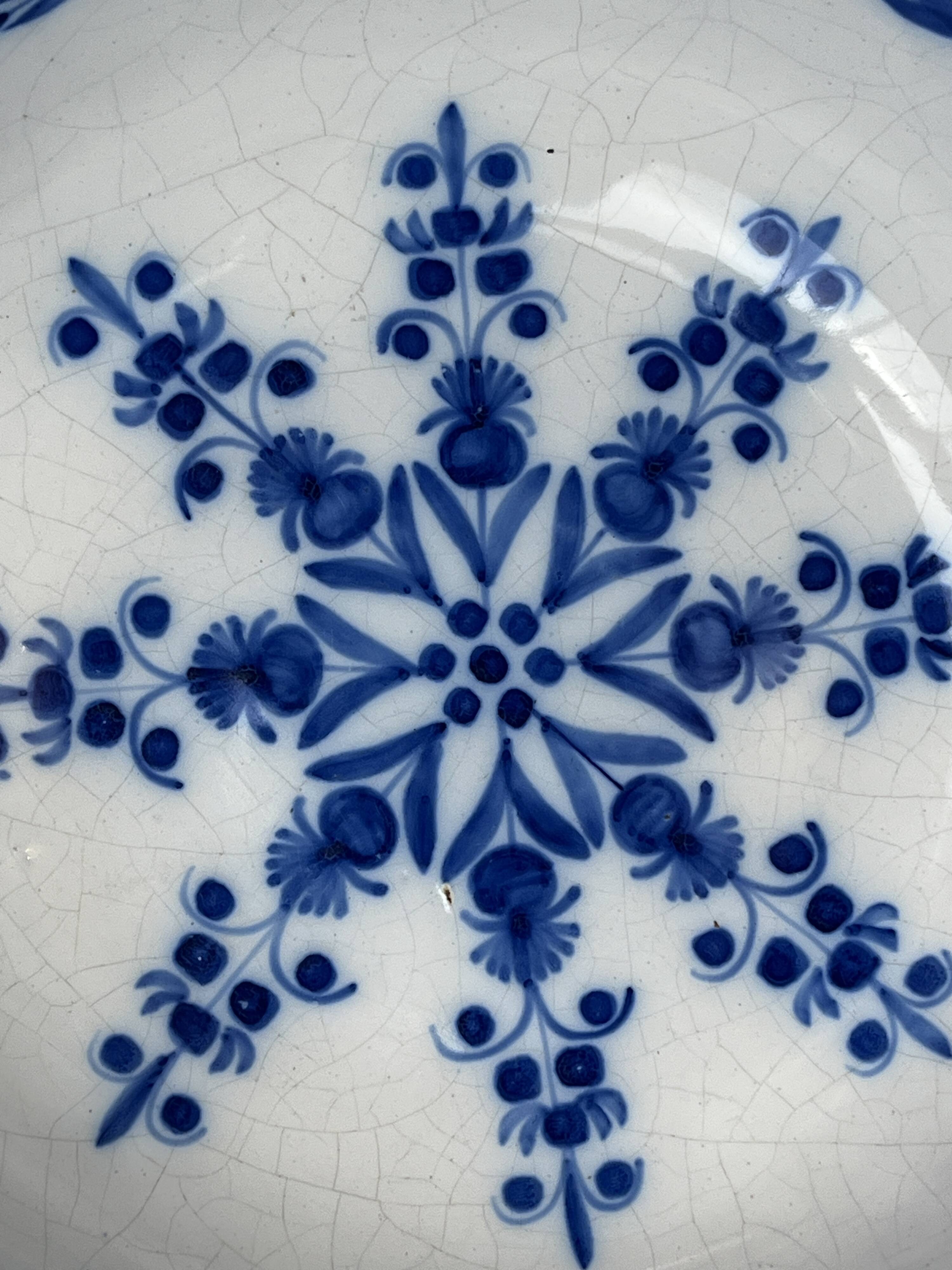 Rambervillers, antique earthenware dish with blue decoration from the 19th century.
