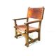 Chaise de château brutaliste ancienne faite à la main en chêne et cuir cognac, années 1920.