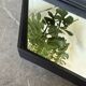 Miroir brutaliste losange en fer
