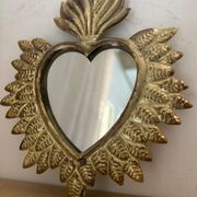Golden ex-voto wall heart
