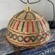 Vintage suspension in electrified braided wicker to nine