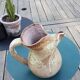 Old cider pitcher in varnished sandstone early 20th century