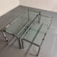 2 large nesting coffee tables in chrome and glass, 1970s design.