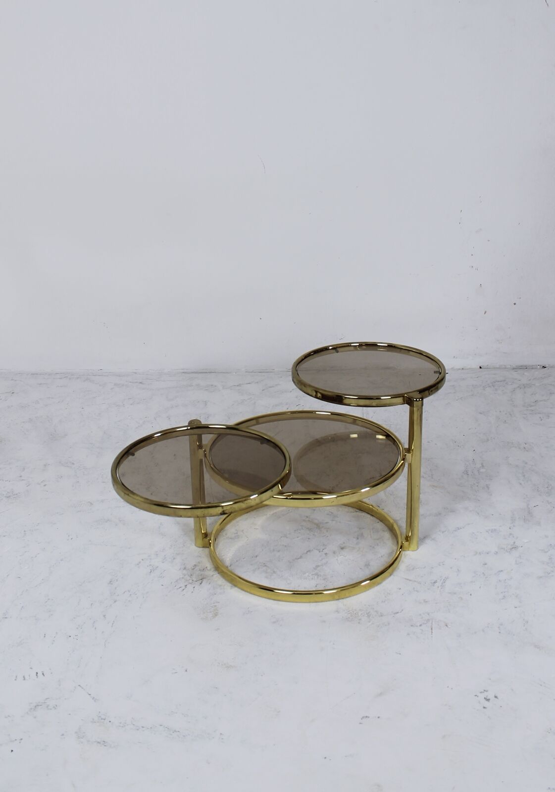 Mid century brass plated 3-tier swivel coffee table after Milo Baughman