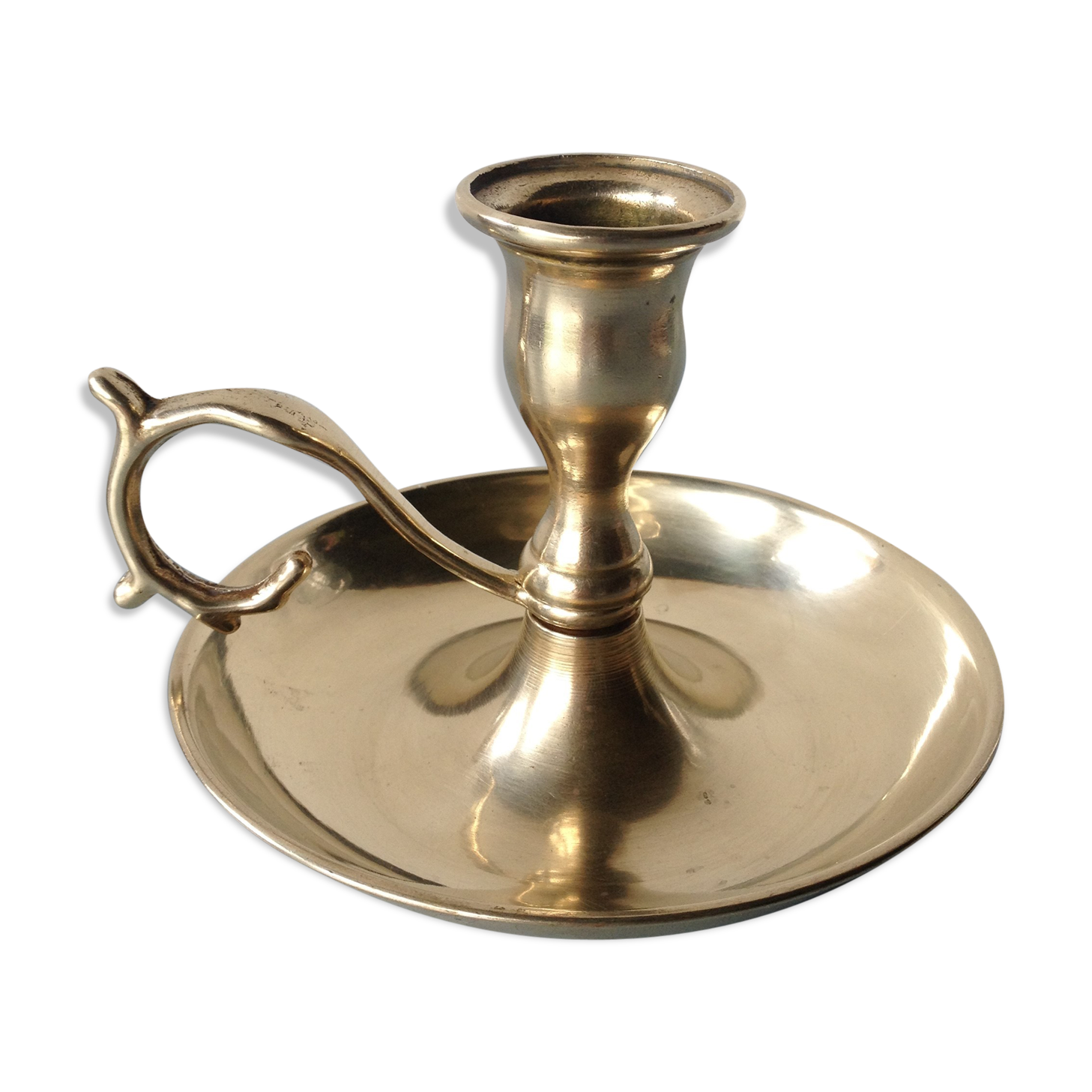 Thumb taper brass candlestick