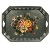 Painted metal tray decorated with flowers on a green background