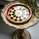 Vintage decorative plate in red, black, and gold metal, Poland, 1960s.
