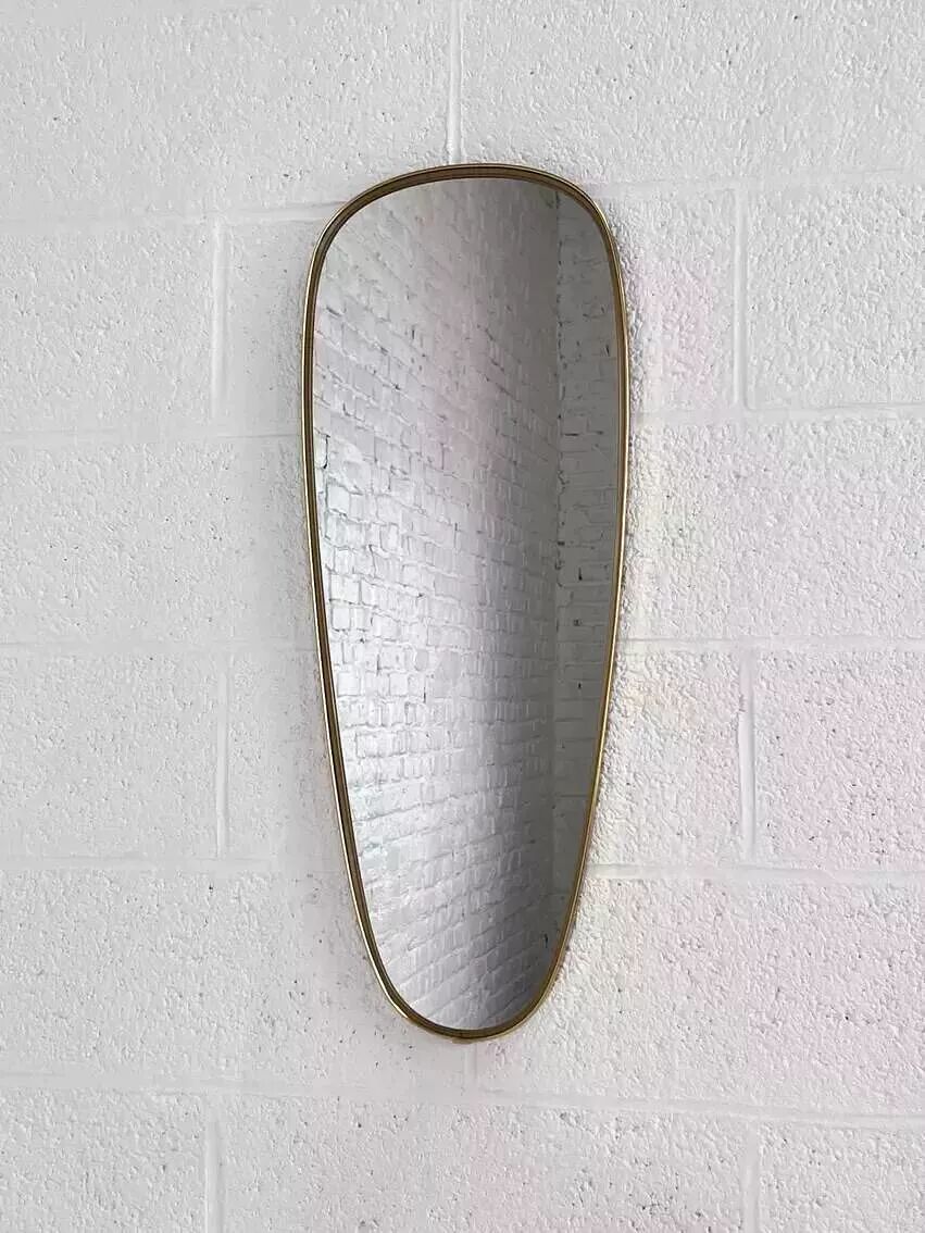 Miroir doré rétroviseur et forme libre des années 50