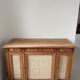 Classic vintage buffet with 3 doors in wood and raffia.