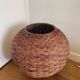Large vintage lampshade made of hand-woven rattan.