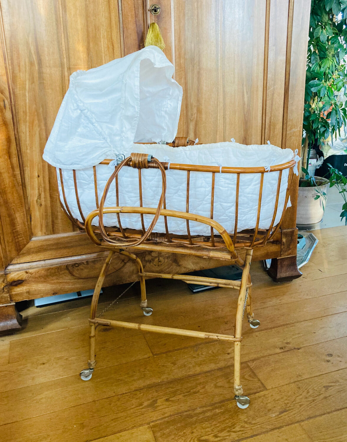 Bamboo, rattan, wicker cradle bassinet from the 1960s with a foldable support.