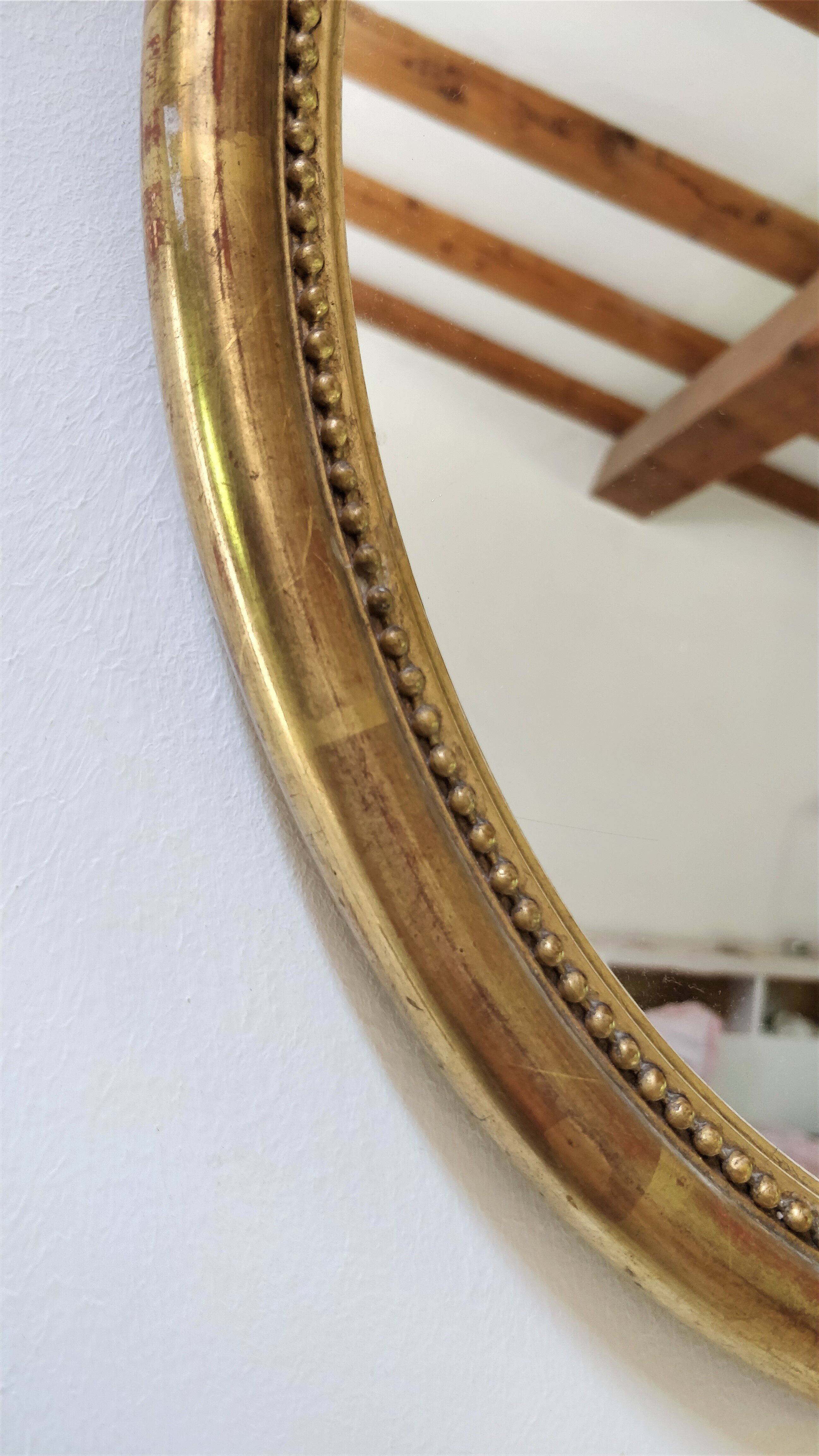 Golden oval mirror 41/35 cm