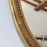 Golden oval mirror 41/35 cm