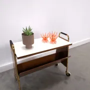 Vintage 1950s side table with a reading basket, formica top, teak wood.