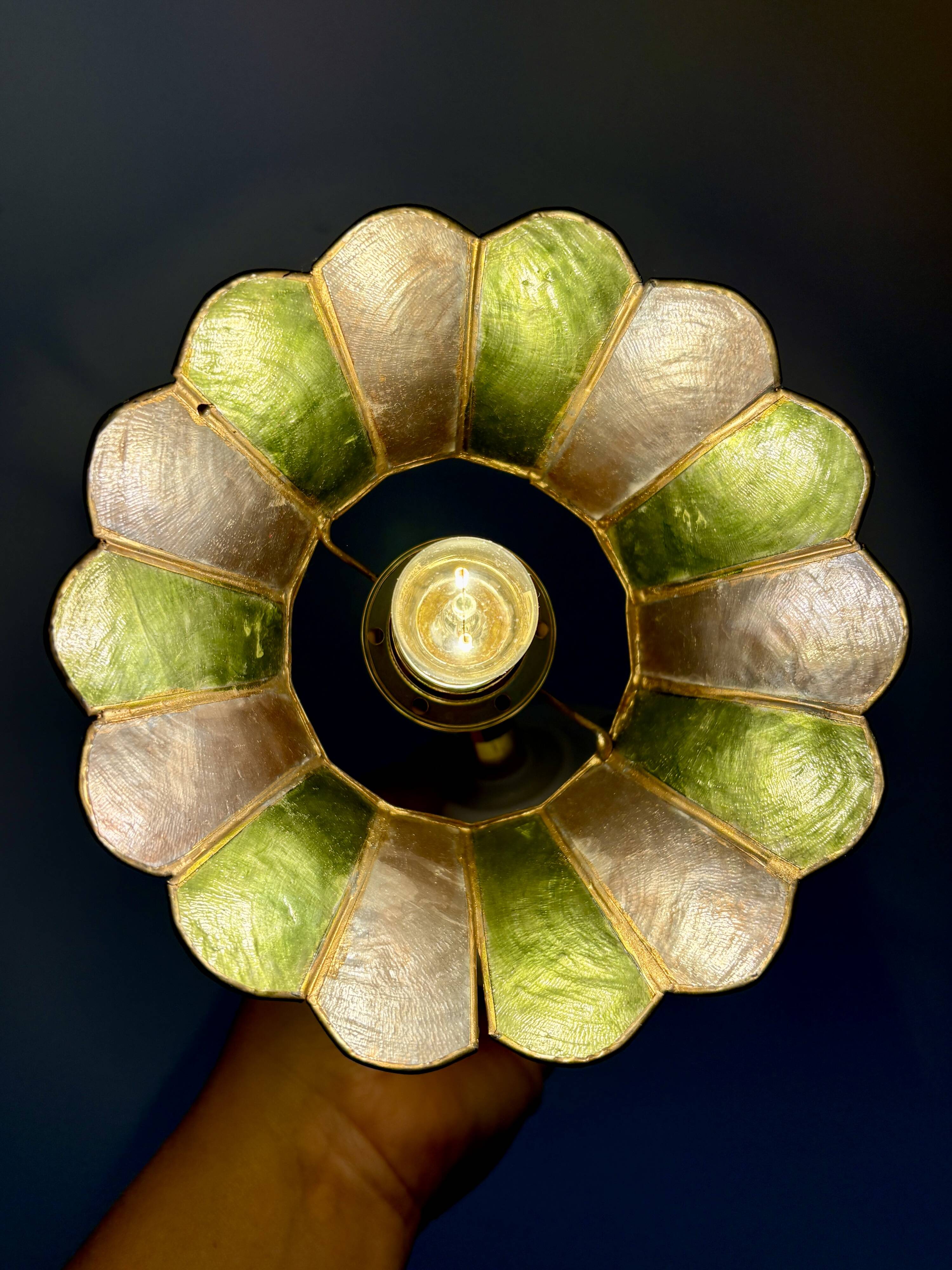 Vintage wall lamp with a green and pink mother-of-pearl lampshade