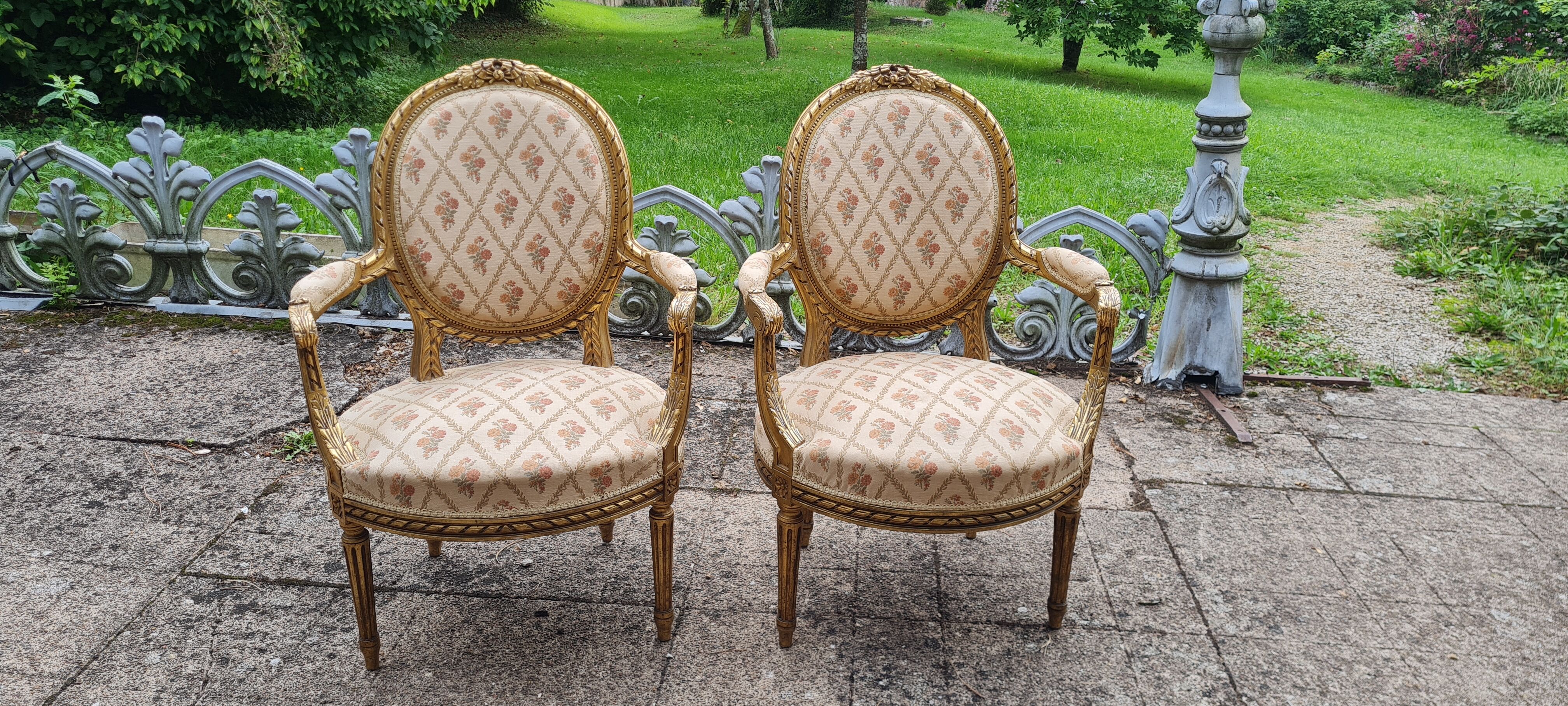 Pair of armchairs medallion in gilded wood Louis XVI style
