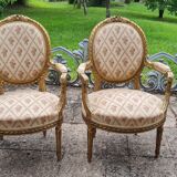 Pair of armchairs medallion in gilded wood Louis XVI style