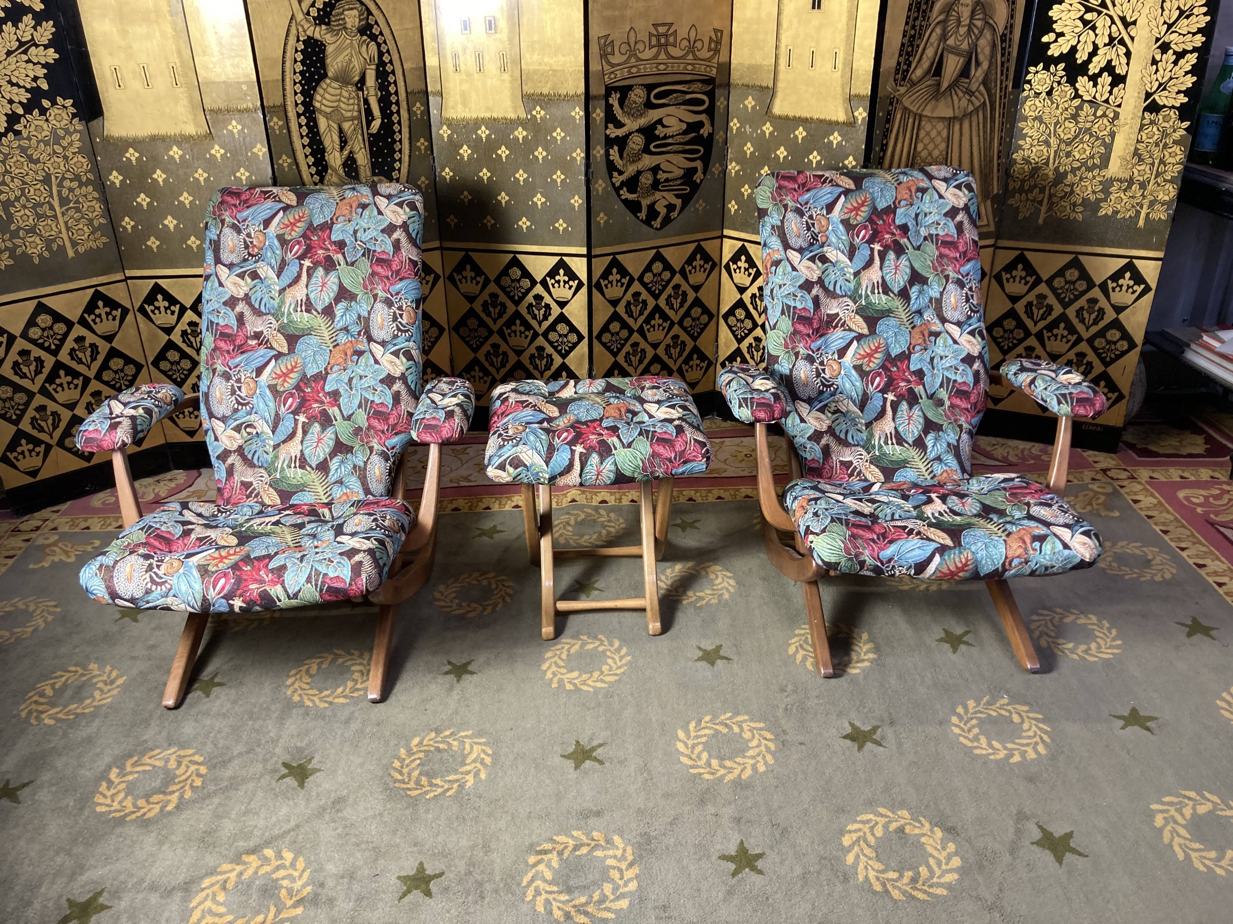 Pair of poly comfort armchairs and 1 footrest