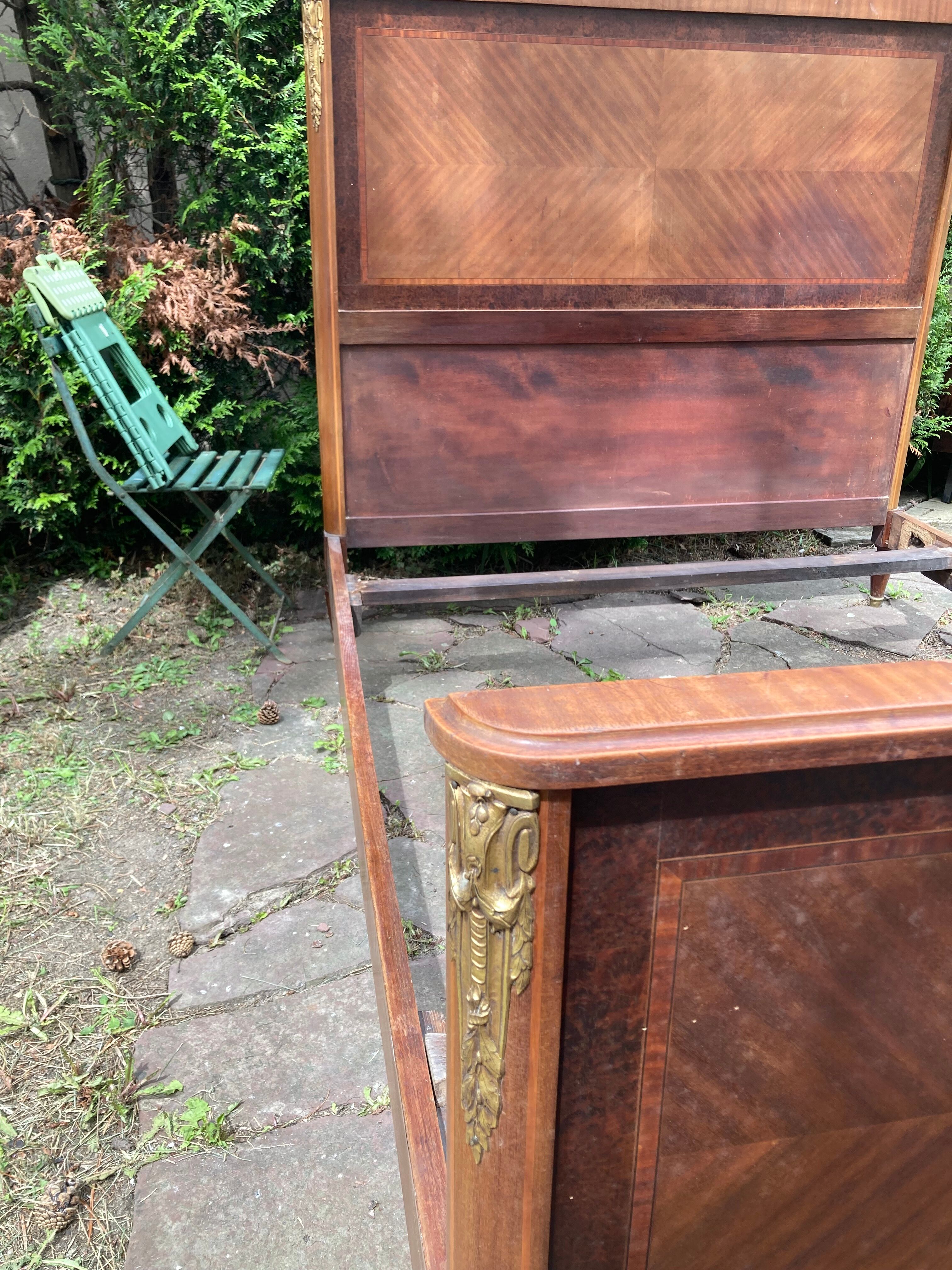 1926 tuya and mahogany bed