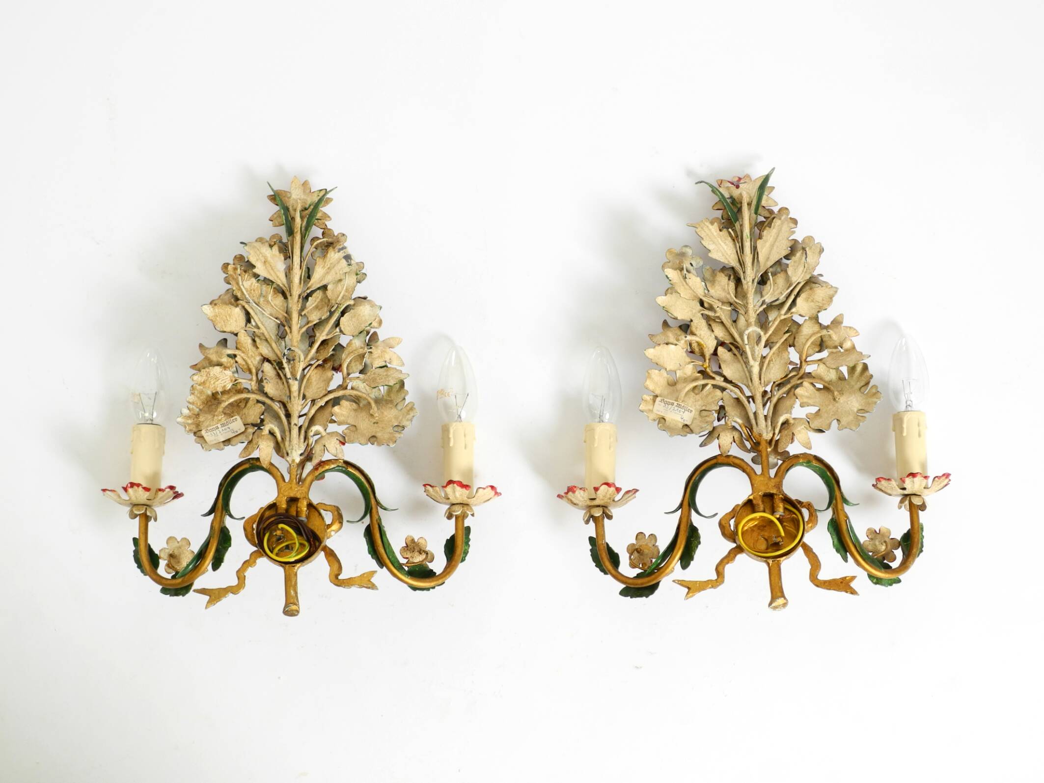 A pair of beautiful 1960s hand-painted and gilded metal wall lamps by Hans