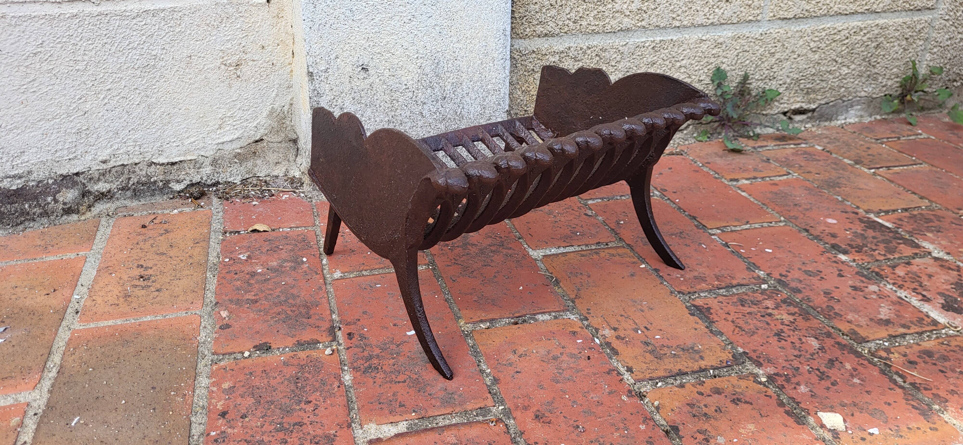 Cast iron fireplace basket log holder